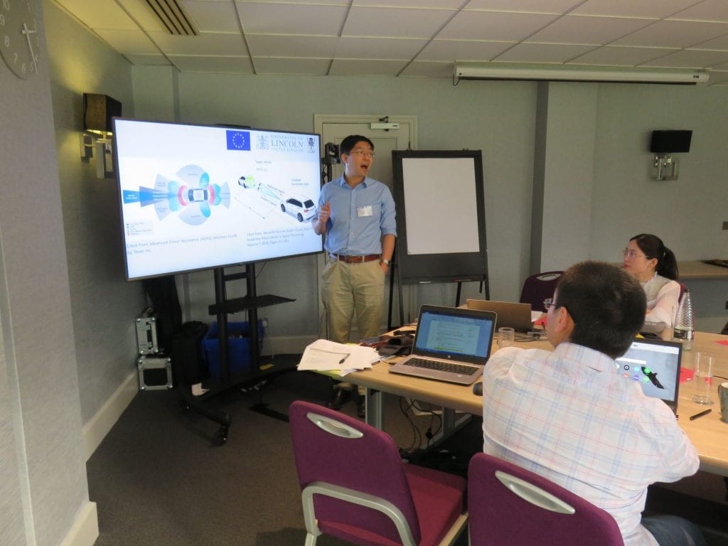 Yicheng Zhang presenting at the ULTRACEPT mid-term meeting held in Cambridge UK
